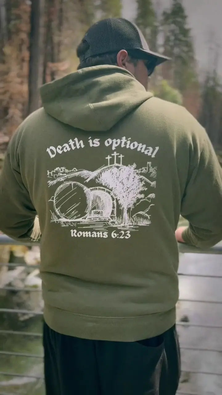 Back of the olive Death Is Optional hoodie in original bridge footage